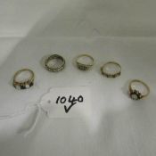 4 9ct gold rings and one other