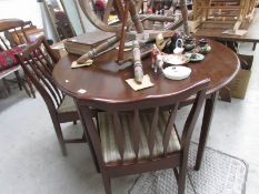 A mahogany table and 4 chairs