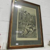 A framed engraving of hunting dogs, signed