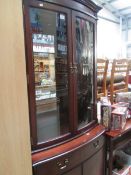 A mahogany effect display cabinet