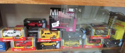 A quantity of boxed diecast cars, mainly Burago