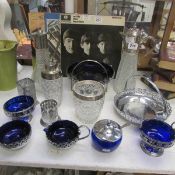 A mixed lot of glass and silver plate including claret jugs