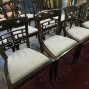 A set of 4 spindle back dining chairs