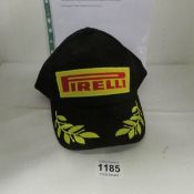 A Pirelli race winner cap, donated by Mother of Chris Jones