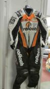 A signed set of racing leathers 'Chris 'The Stalker' Walker' with signed photo