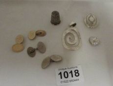 A silver pendant, lockets, thimble and cuff links (40gms)