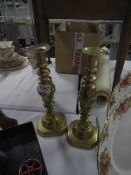 A pair of 'The 1901' brass candlesticks
