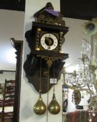A small Zann Damm wall clock