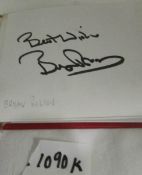 An autograph book with Stanley Matthews, Brian Robson and 10 others