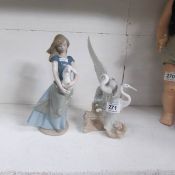 A NAO girl with rabbit and a NAO stork group