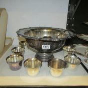 A silver plated punch bowl and ladel
