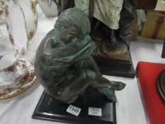 A bronze figure of a nude girl signed Leonardo and Rossi
