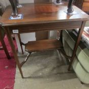 An inlaid mahogany table side