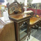An Edwardian cabinet with mirror back