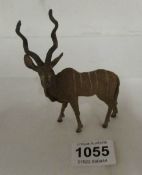 A cold painted bronze antelope