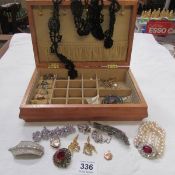 A box of costume jewellery including small 9ct gold pendant