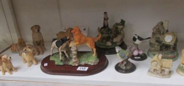 A quantity of animal groups and bird figurines