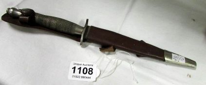 A WW1 Fair-Burn Sykes Wilkinson Sword MK1 fighting knive in leather sheath