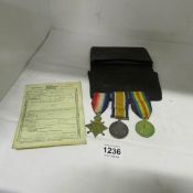 A set of WW1 medals including 1914/18 star for 2571Pte. F Blake, with discharge paper