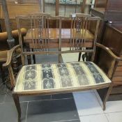 An Edwardian inlaid 2 seater settee