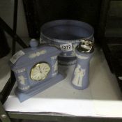 A Wedgwood Jasperware bowl, clock and table lighter
