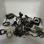 A box of costume jewellery and lace (black)