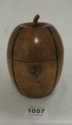 A melon shaped tea caddy with key