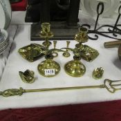 A mixed lot of brassware including candlesticks