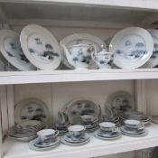 A Japanese hand painted tourist ware dinner service