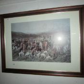 A large framed and glazed print meeting of gundogs
