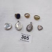 4 silver lockets and 3 assorted dress rings