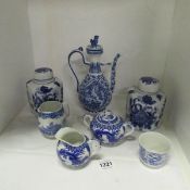 A mixed lot of blue and white pottery, ginger jars, jugs etc