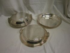 A pair of silver plated entrée' dishes