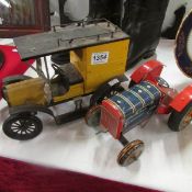 A tinplate clockwork Mettoy tractor and a tinplate Model T Ford van