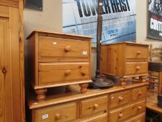 A pair of pine bedside chests