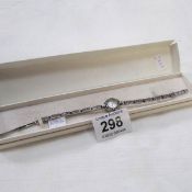 An Ergo boxed silver and marcasite ladies mechanical wrist watch