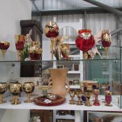 A mixed lot of gold decorated red and blue glass