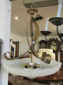A large 6 lamp ceiling light
A large 6 lamp ceiling light