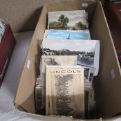 A box of old postcards including Lincoln