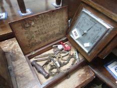 An oak barometer and a box and contents