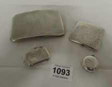 A HM silver cigarette case, vesta case, sovereign case and silver compact