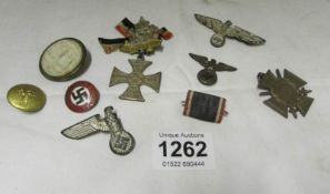 A box of German and Nazi badges etc