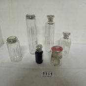 4 silver topped vanity case bottles and 2 silver topped scent bottles, some a/f