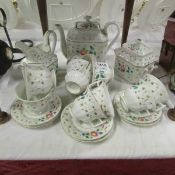 A 22 piece mid 19th century hand painted Staffordshire tea set