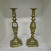 A pair of large 'The 1901' brass candlesticks