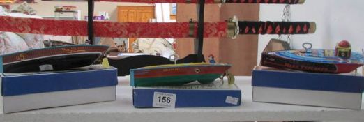 3 tinplate clockwork boats by Schylling, 2 boxed