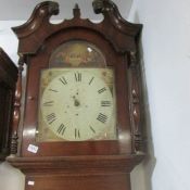 A Grandfather clock with last supper scene on face