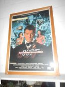 A framed film poster of Ian Fleming's James Bond 'Tomorrow Never Dies'
