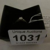 A white gold diamond solitaire ring (20 pts)