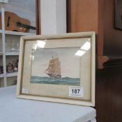 A framed and glazed watercolour of a sailing ship